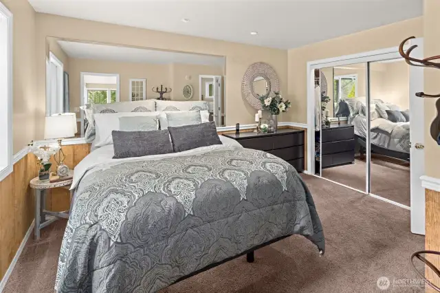 Welcoming and spacious Primary Suite with ensuite bathroom.