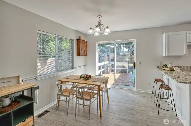 Dining area with backyard access.