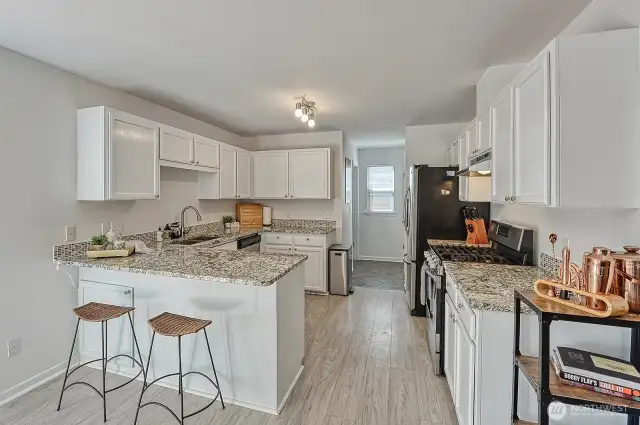 Kitchen with eating bar.