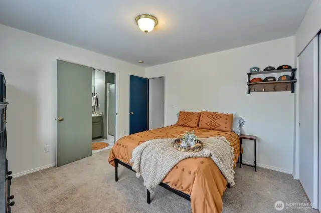 Primary bedroom with 3/4 bathroom and double closets!