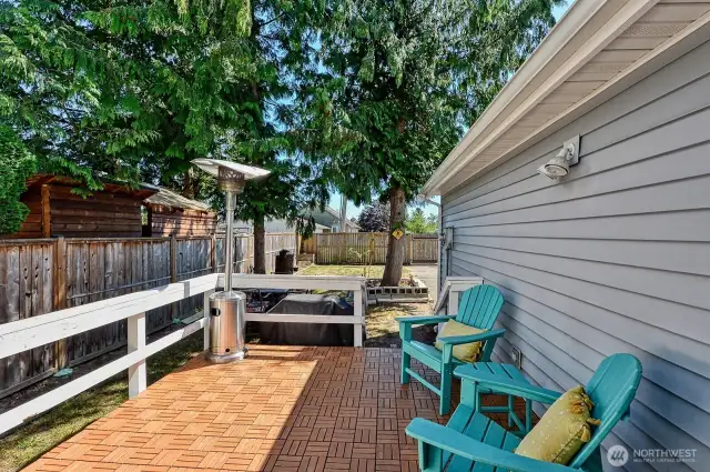 Back deck with large, fully fenced yard.