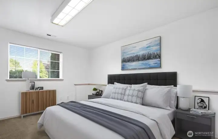Downstairs front bedroom - virtually staged.