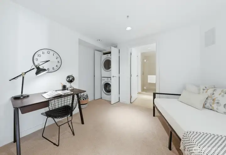 A flexible space that can be utilized as a second bedroom, office, yoga/meditation room, or personal gym.