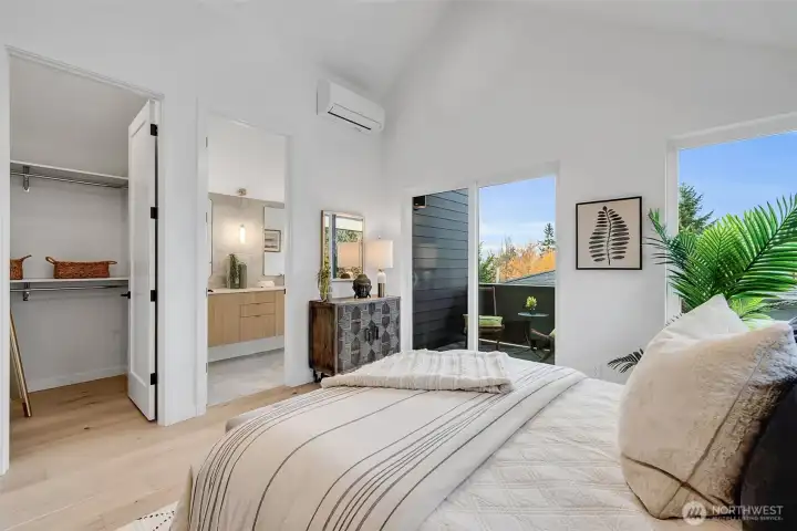 Primary bedroom facing bathroom