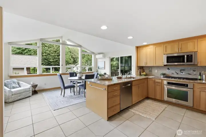The kitchen is the heart of any home and this one surely impresses. Expanded in 2009, you will love this great room space; perfect for every day living and entertaining friends. The kitchen is the heart of any home and this one surely impresses. Expanded in 2009, you will love this great room space; perfect for every day living and entertaining friends.