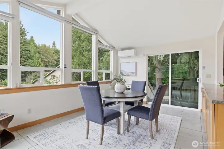 The gathering space adjacent to the kitchen is ready for you to furnish as you wish. Through the sliding glass door you will find a covered deck which provides access to the yard and the perfect spot for your bbq! The gathering space adjacent to the kitchen is ready for you to furnish as you wish. Through the sliding glass door you will find a covered deck which provides access to the yard and the perfect spot for your bbq!