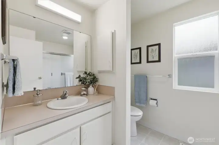 The 3/4 bathroom in the primary suite. The 3/4 bathroom in the primary suite.