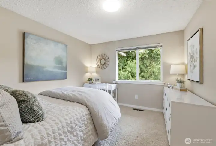 This home has 4 bedrooms on the main level which means that no one has to sleep downstairs. Like the primary suite, the bedrooms all are above average in size. This home has 4 bedrooms on the main level which means that no one has to sleep downstairs. Like the primary suite, the bedrooms all are above average in size.