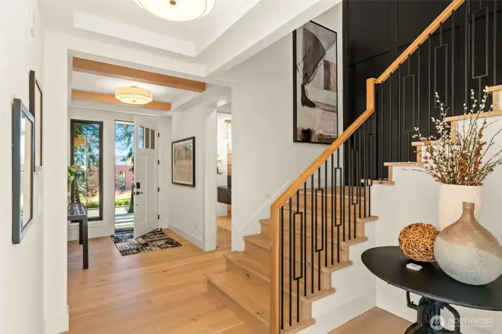 Dramatic entry with wood beams