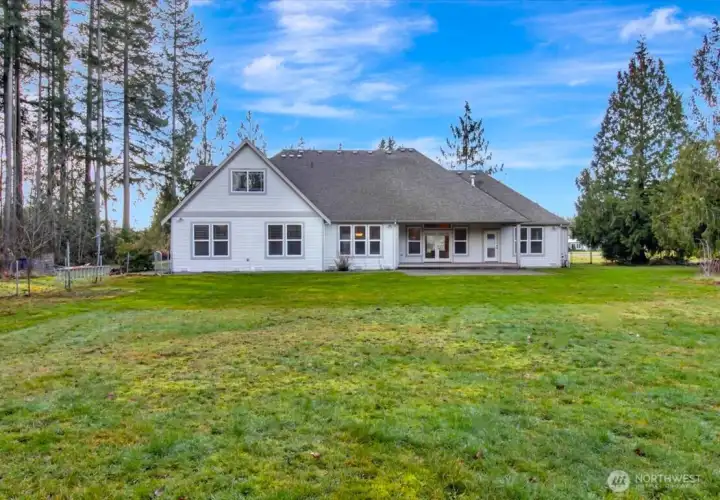 Backyard looking West. Full patio as well.