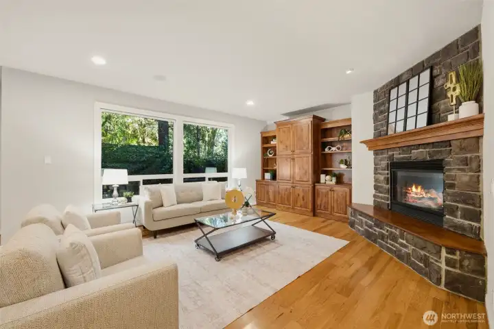 Family room w/ a gas fireplace for cozy winter nights.