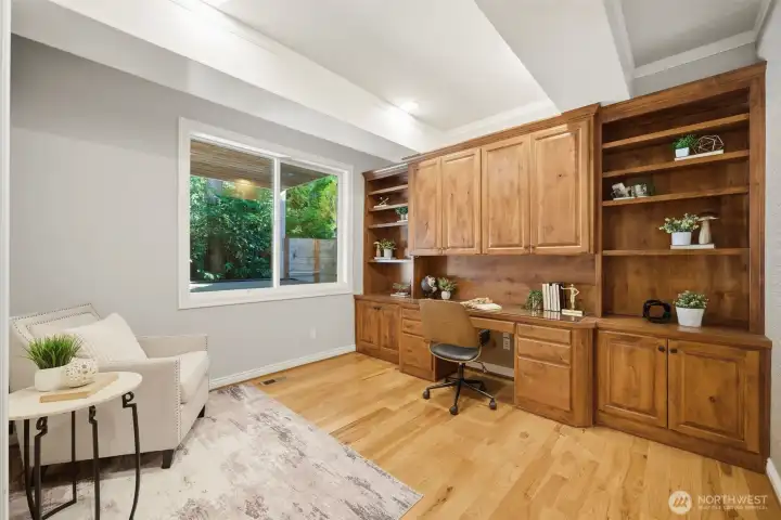 Main floor office with custom built alderwood, Acorn cabinetry.
