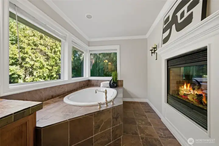 Unwind with a view and a fire in the soaking tub.