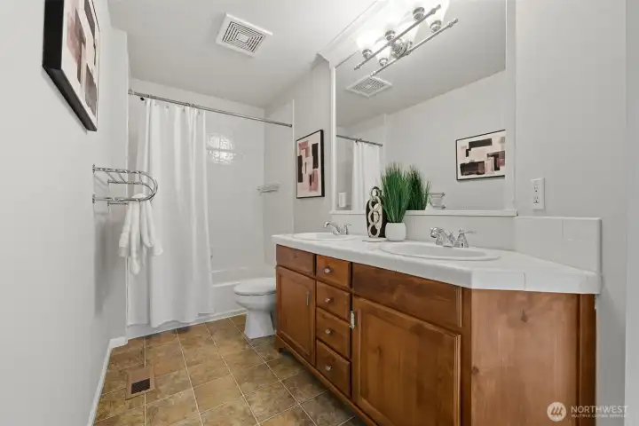Jack-and-Jill bathroom between first and second bedrooms.