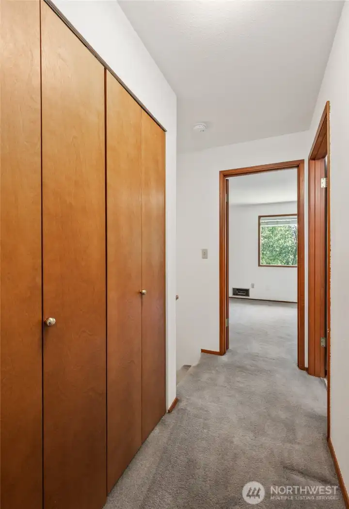 2nd floor hallway with a large linen closet.