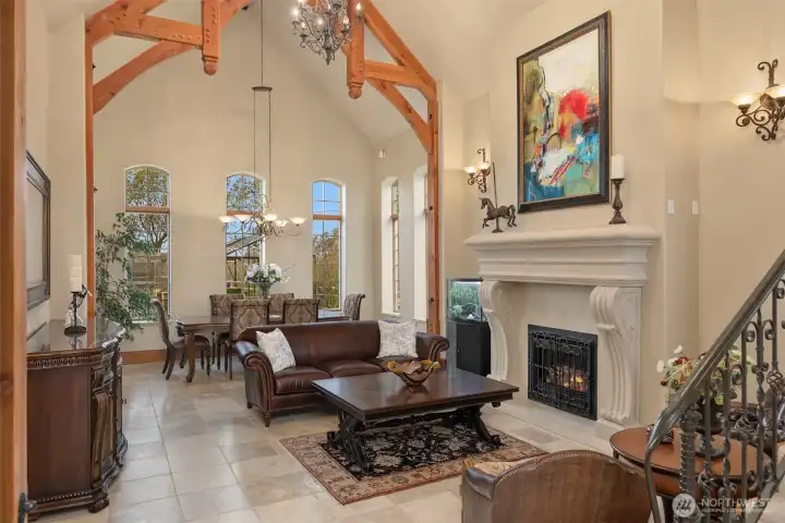 You are greeted by soaring timber framed 24' ceilings. Limestone with an architectural limestone gas fireplace and mantel.