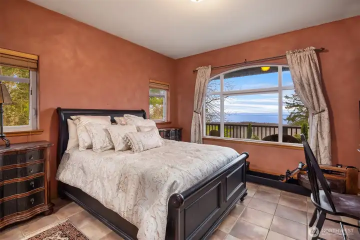 Large guest bedroom complete with marine views.