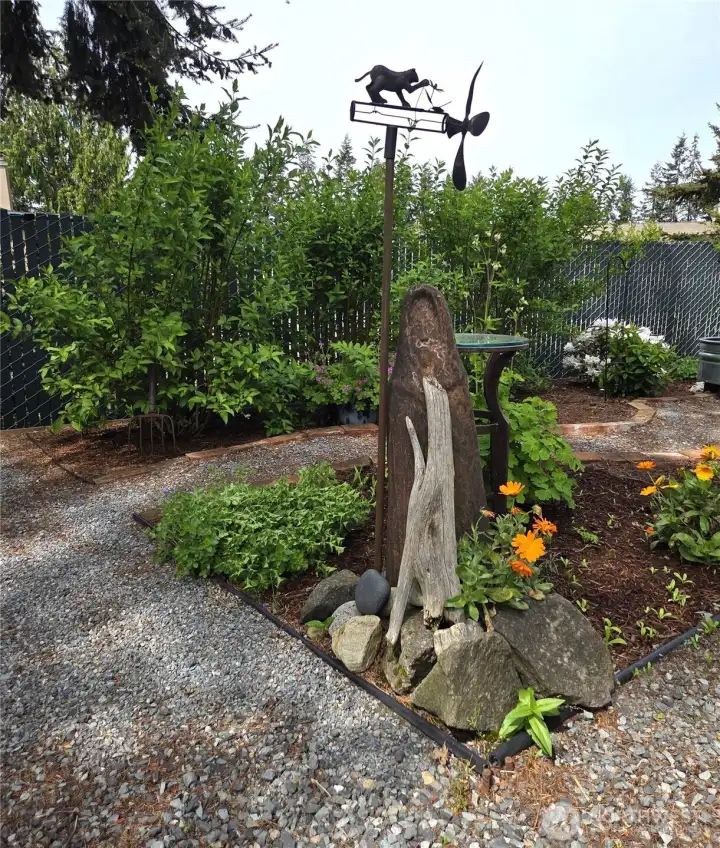 A true backyard sanctuary with space to relax, garden, and enjoy the outdoors. A true backyard sanctuary with space to relax, garden, and enjoy the outdoors.