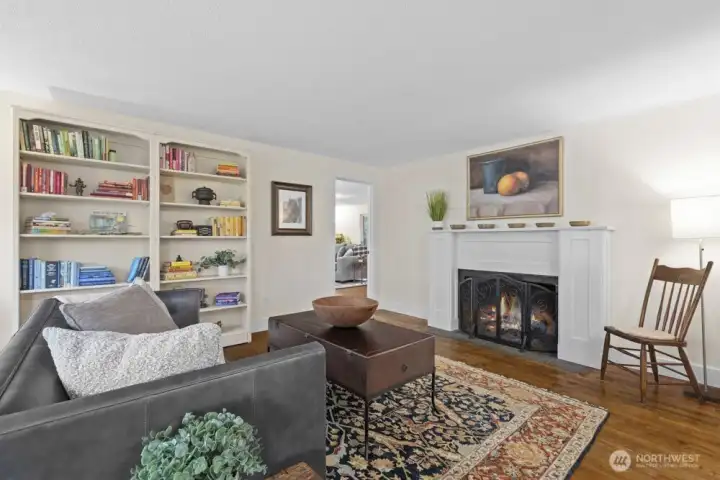 The doorway beyond the fireplace leads to the family room. The fireplace chimney was rebuilt in 2023.