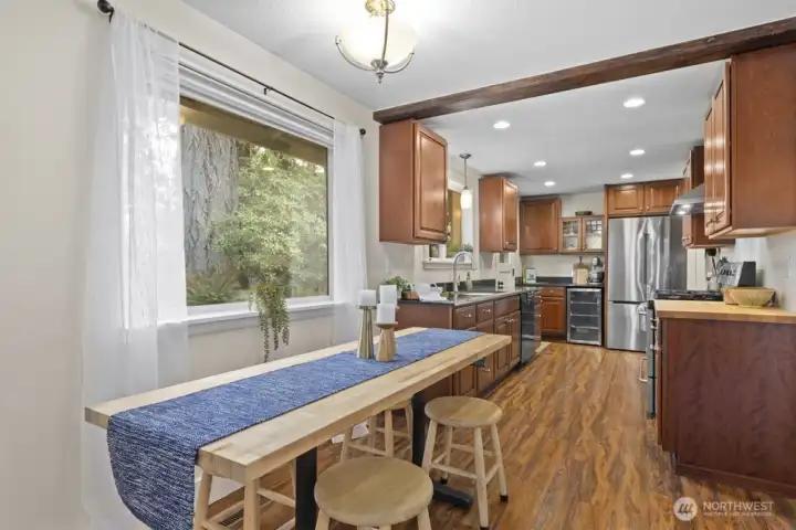 The sheer curtains do not convey, but the windows are outfitted with blinds that were installed in 2023.