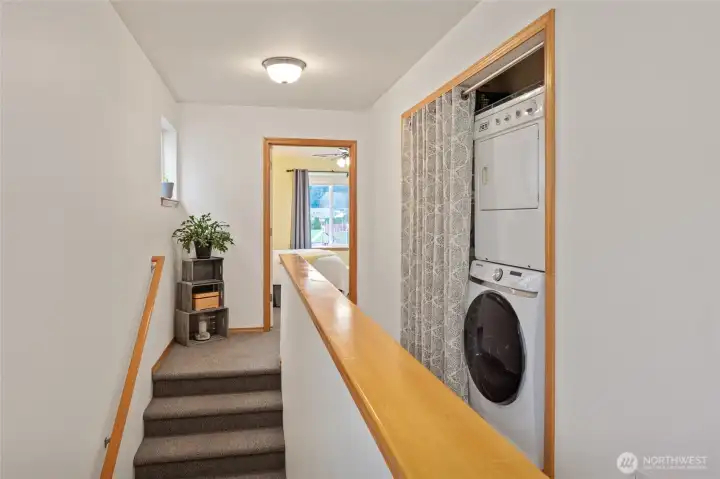 Primary bedroom suite on one side of the untit & other two bedrooms on the front half of the home