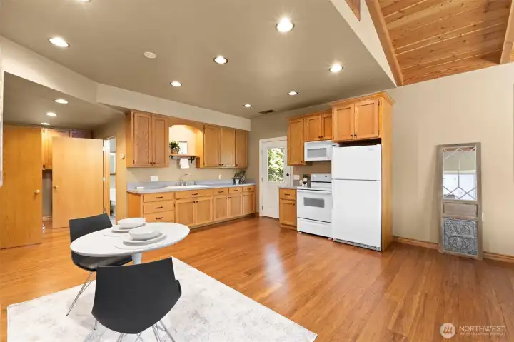 Detached ADU, view from sliding door garage access. Full kitchen, plenty of room for an island or larger kitchen table.