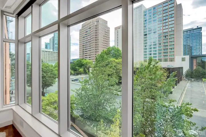 Large windows with roller shades for privacy