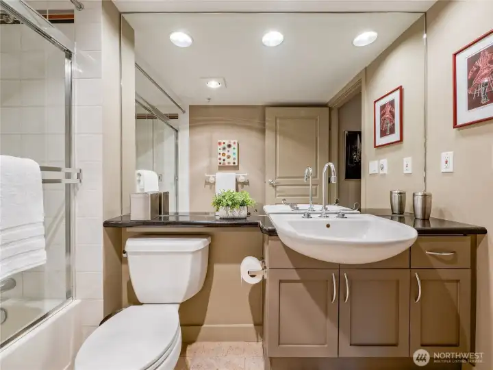 A sanctuary of timeless stone, premium cabinetry, and ageless luxury that transforms daily rituals into a seamless, spa-grade escape.