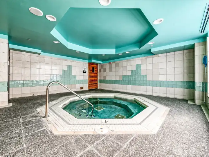 Pure lifestyle luxury, featuring a custom hot tub within the building's professional fitness amenities to transform everyday health into a resort experience.