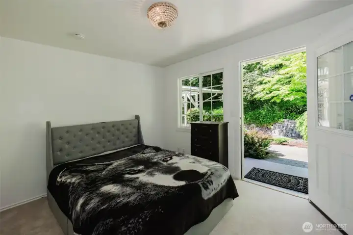 Upstairs bedroom features its own separate entrance from the beautifully landscaped backyard, offering added privacy and convenience for guests, extended stays, or flexible living arrangements. Upstairs bedroom features its own separate entrance from the beautifully landscaped backyard, offering added privacy and convenience for guests, extended stays, or flexible living arrangements.