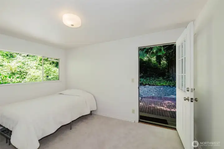 Another upstairs bedroom also enjoys its own private entrance, creating a peaceful and versatile retreat — the perfect space to unwind, recharge, and enjoy a little extra privacy. Another upstairs bedroom also enjoys its own private entrance, creating a peaceful and versatile retreat — the perfect space to unwind, recharge, and enjoy a little extra privacy.