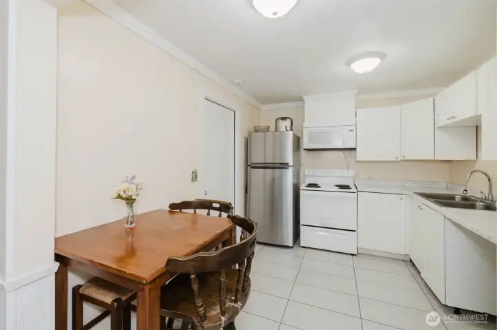 Separate MIL kitchen offers great flexibility with its own dining space, ample cabinetry, and functional layout — ideal for guests, extended living, or added privacy downstairs. Separate MIL kitchen offers great flexibility with its own dining space, ample cabinetry, and functional layout — ideal for guests, extended living, or added privacy downstairs.
