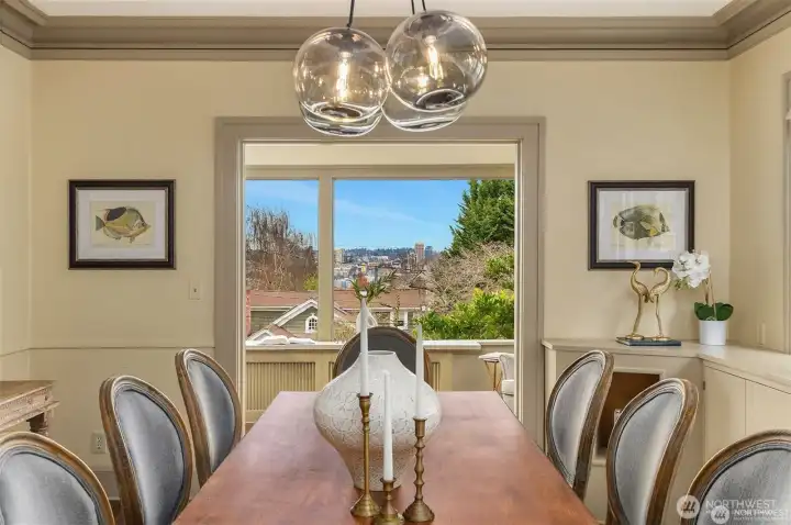 Dining room leads into a reading room facing North with views. Dining room leads into a reading room facing North with views.