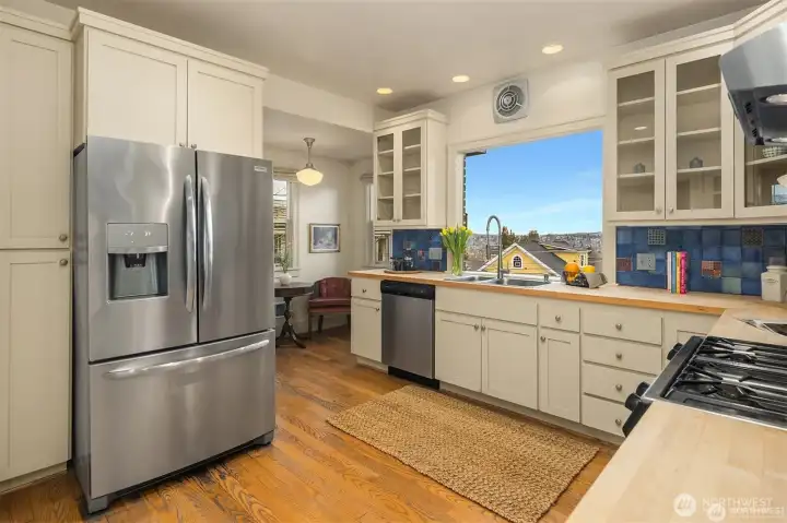 Stainless steel appliances and gas range complete this kitchen. Stainless steel appliances and gas range complete this kitchen.