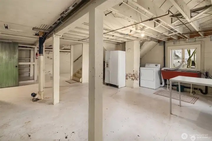 Laundry and extra refrigerator. Laundry and extra refrigerator.