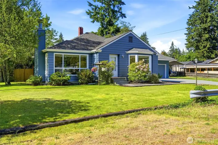 This home on a corner lot boasts charm.