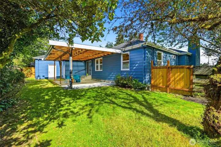 Large backyard and covered patio for entertaining & play