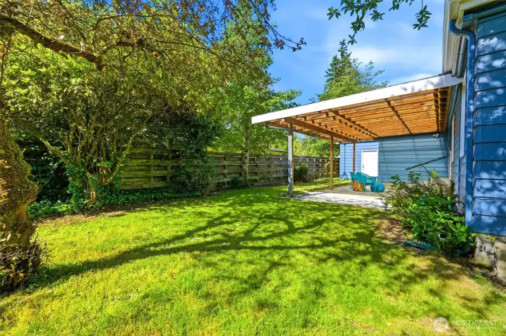 Large backyard and covered patio for entertaining & play