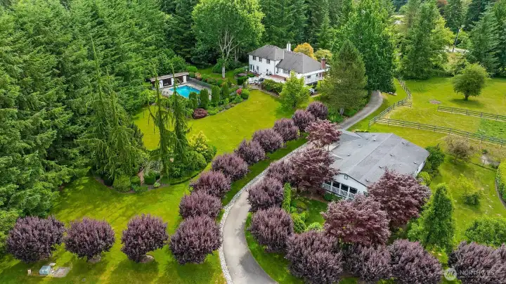 Welcome to your own private country estate, where a long, winding drive lined with graceful plum trees sets the stage for this exceptional retreat. Welcome to your own private country estate, where a long, winding drive lined with graceful plum trees sets the stage for this exceptional retreat.