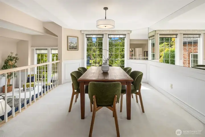 Overlooking the formal living room, the dining room enhances the home's open, airy design while providing an inviting space for memorable gatherings. Overlooking the formal living room, the dining room enhances the home's open, airy design while providing an inviting space for memorable gatherings.