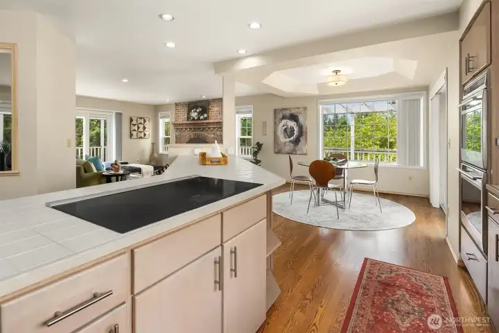 The kitchen flows seamlessly into the family room, creating the perfect setting for gathering with family and friends. The kitchen flows seamlessly into the family room, creating the perfect setting for gathering with family and friends.