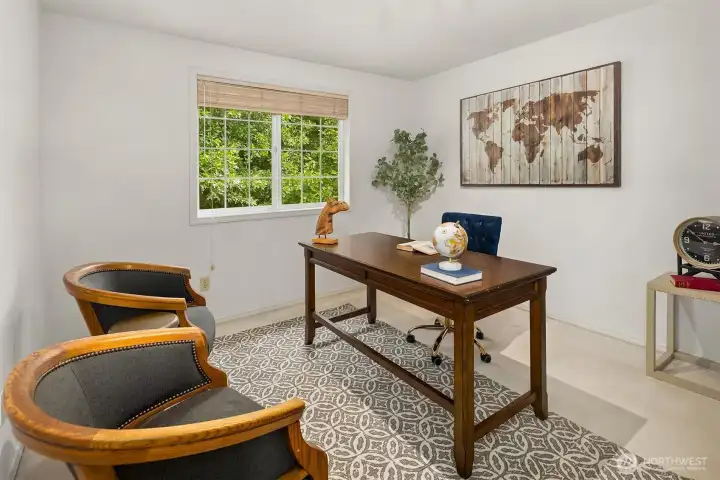 The fourth bedroom is thoughtfully staged as a private office, offering a versatile space for working from home, guests, or additional living needs. The fourth bedroom is thoughtfully staged as a private office, offering a versatile space for working from home, guests, or additional living needs.