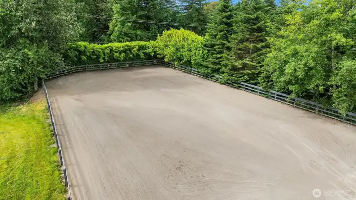 The private outdoor riding arena provides a dedicated space for training, exercise, and enjoying the equestrian lifestyle right at home. The private outdoor riding arena provides a dedicated space for training, exercise, and enjoying the equestrian lifestyle right at home.