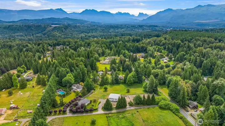 This stunning estate is framed by the beauty of the Cascade Mountain Range in the distance, providing a spectacular backdrop for a lifestyle filled with outdoor recreation and exploration. This stunning estate is framed by the beauty of the Cascade Mountain Range in the distance, providing a spectacular backdrop for a lifestyle filled with outdoor recreation and exploration.