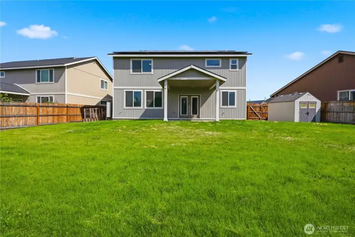 Large backyard with shed