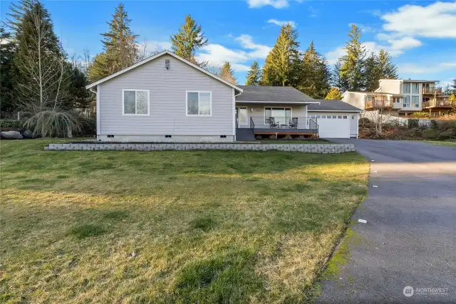 Welcome home! This beautifully updated rambler sits on a spacious ¾-acre lot with stunning Cascade Mountain views.