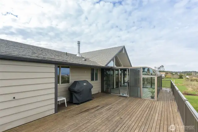 large deck with sunroom