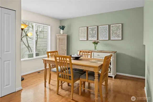 Formal dinning area with large window allowing for natural light.