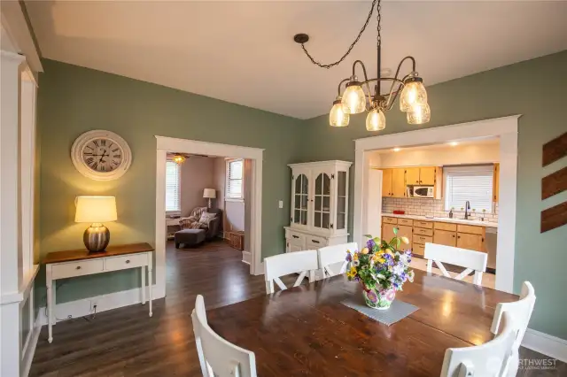 The large open dining room flows to the flex room and kitchen.