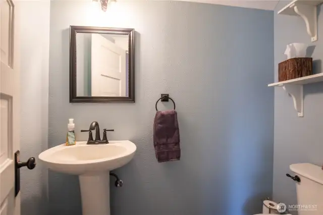 The powder room / guest half bath is located on the main floor.
